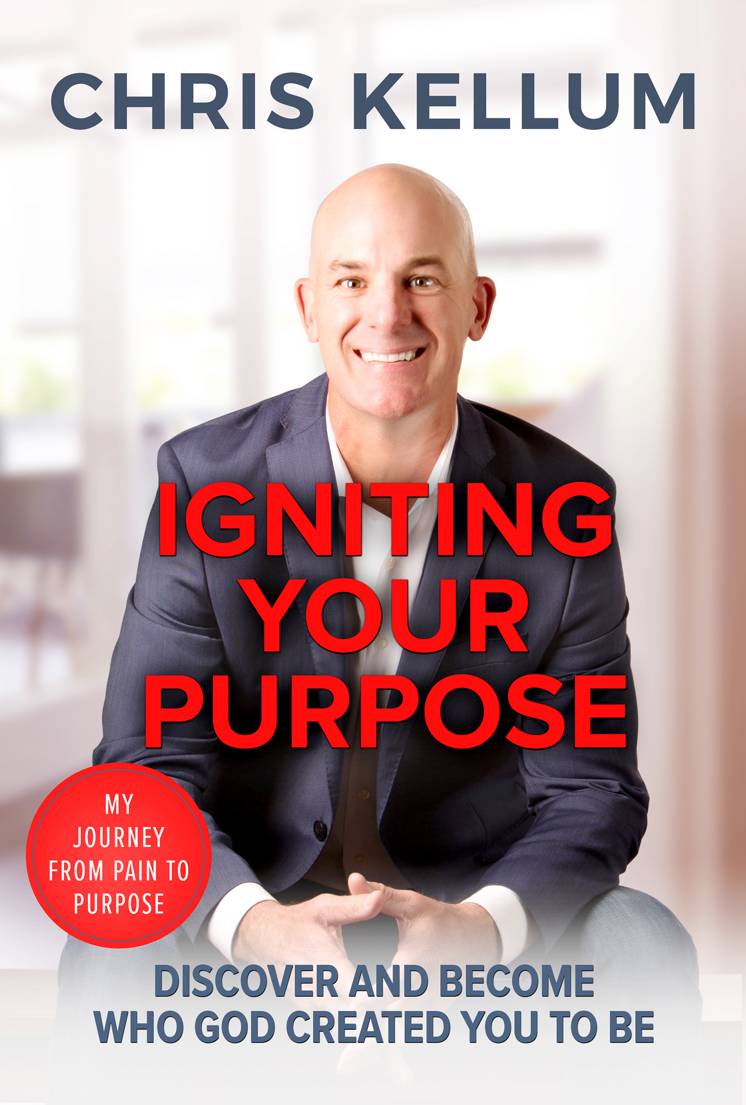 Chris Kellum sits in the middle of the cover with a large smile. At the top of the cover is his name CHRIS KELLUM. In the middle of the cover, overlayed over him beneath his face, is the title IGNITING YOUR PURPOSE. At the very bottom of the cover are the words DISCOVER AND BECOME WHO GOD CREATED YOU TO BE.